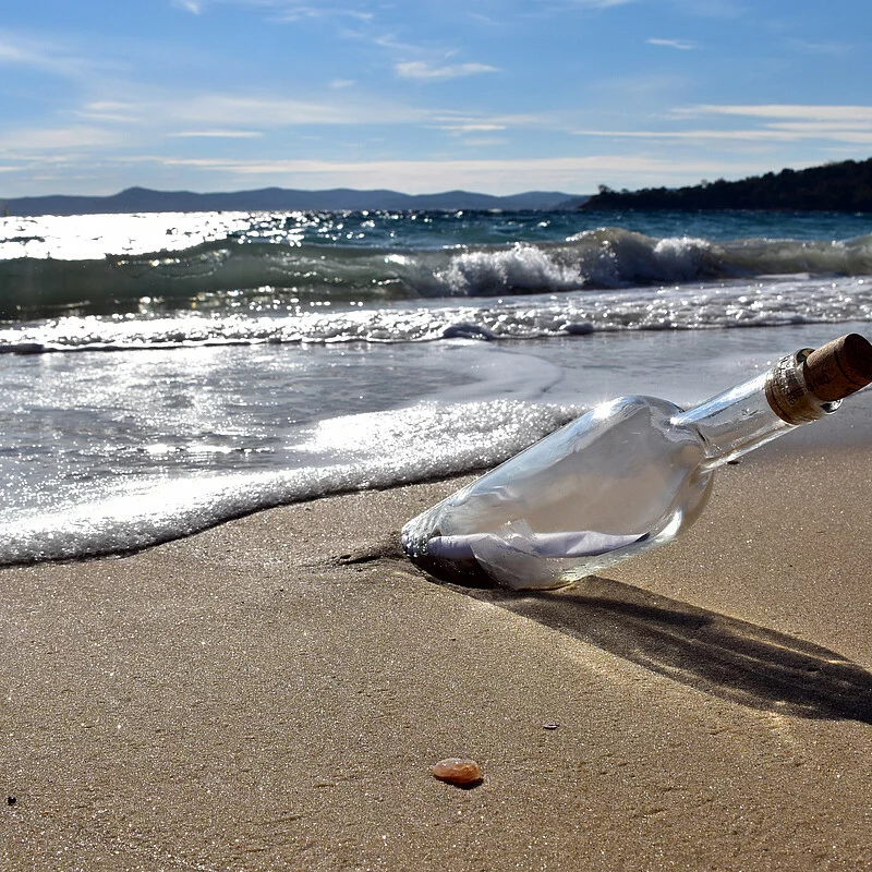 Message in a bottle on the beach