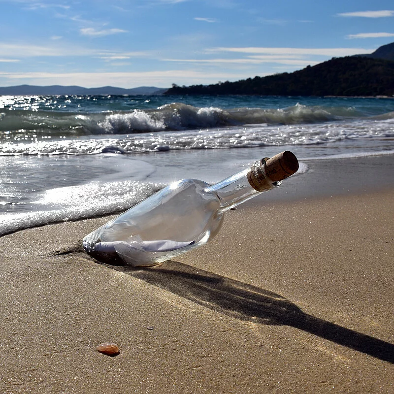 Message in a bottle on the beach